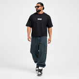 تیشرت باکسی مردانه مچینست مدل Tokyo Japan با تنخور آزاد و چاپ گرافیکی بزرگ پشت